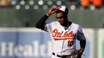 BALTIMORE, MD - SEPTEMBER 30: Adam Jones #10 of the Baltimore Orioles waves to crowd after being pulled from the game in the ninth inning against the Houston Astros at Oriole Park at Camden Yards on September 30, 2018 in Baltimore, Maryland. (Photo by Rob Carr/Getty Images)