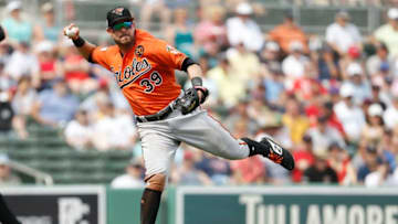 FORT MYERS, FLORIDA - FEBRUARY 27: Renato Nunez #39 of the Baltimore Orioles throws out a runner at first base against the Boston Red Sox during the Grapefruit League spring training game at JetBlue Park at Fenway South on February 27, 2019 in Fort Myers, Florida. (Photo by Michael Reaves/Getty Images)