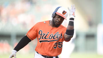 BALTIMORE, MD - APRIL 20: Dwight Smith Jr. #35 of the Baltimore Orioles celebrates hitting a two run home run in the third inning during game one of a doubleheader baseball game against the Minnesota Twins at Oriole Park at Camden Yards on April 20, 2019 in Washington, DC. (Photo by Mitchell Layton/Getty Images)