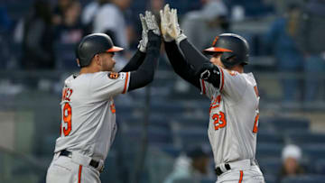 NEW YORK, NEW YORK - MARCH 31: Joey Rickard #23 of the Baltimore Orioles celebrates his eighth inning two run home run against the New York Yankees with teammate Renato Nunez #39 at Yankee Stadium on March 31, 2019 in the Bronx Borough of New York City. (Photo by Jim McIsaac/Getty Images)