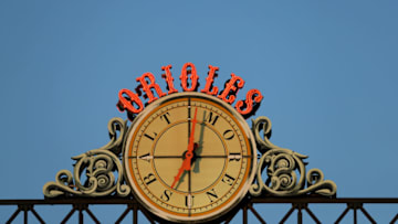 BALTIMORE, MARYLAND - APRIL 06: The clock above the scoreboard is shown during the Baltimore Orioles and New York Yankees game at Oriole Park at Camden Yards on April 06, 2019 in Baltimore, Maryland. (Photo by Rob Carr/Getty Images)