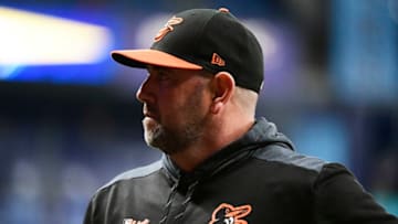 ST PETERSBURG, FLORIDA - APRIL 17: Manager Brandon Hyde #18 of the Baltimore Orioles looks towards the bench after a discussion with umpire CB Bucknor #54 during the third inning against the Tampa Bay Rays at Tropicana Field on April 17, 2019 in St. Petersburg, Florida. (Photo by Julio Aguilar/Getty Images)