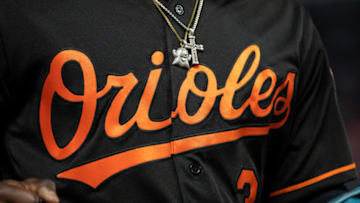 MINNEAPOLIS, MN - APRIL 26: The necklace and jersey of Dwight Smith Jr. #35 of the Baltimore Orioles against the Minnesota Twins on April 26, 2019 at the Target Field in Minneapolis, Minnesota. The Twins defeated the Orioles 6-1. (Photo by Brace Hemmelgarn/Minnesota Twins/Getty Images)