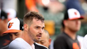 BALTIMORE, MARYLAND - MAY 29: Trey Mancini #16 of the Baltimore Orioles celebrates in the dugout after scoring against the Detroit Tigers in the first inning at Oriole Park at Camden Yards on May 29, 2019 in Baltimore, Maryland. (Photo by Rob Carr/Getty Images)