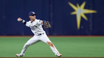 ST. PETERSBURG, FL - MAY 28: Andrew Velazquez #11 of the Tampa Bay Rays makes a throw to first in the fifth inning of a baseball game against the Toronto Blue Jays at Tropicana Field on May 28, 2019 in St. Petersburg, Florida. (Photo by Mike Carlson/Getty Images)