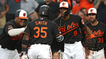 BALTIMORE, MARYLAND - MAY 31: Dwight Smith Jr. #35 of the Baltimore Orioles celebrates with teammates after hitting a grand slam home run against the San Francisco Giants during the first inning at Oriole Park at Camden Yards on May 31, 2019 in Baltimore, Maryland. (Photo by Patrick Smith/Getty Images)
