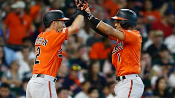 HOUSTON, TEXAS - JUNE 08: Richie Martin #1 of the Baltimore Orioles receives a high five from Stevie Wilkerson #12 after hitting a home run in the ninth inning against the Houston Astros at Minute Maid Park on June 08, 2019 in Houston, Texas. (Photo by Bob Levey/Getty Images)
