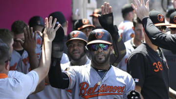 ANAHEIM, CA - JULY 28: Jonathan Villar #2 of the Baltimore Orioles followed by Hanser Alberto #57 are congraulated after being driven in by Trey Mancini #16 in the fifth inning against the Los Angeles Angels of Anaheim at Angel Stadium of Anaheim on July 28, 2019 in Anaheim, California. (Photo by John McCoy/Getty Images)