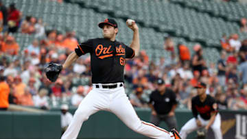 BALTIMORE, MARYLAND - JUNE 28: Starting pitcher John Means #67 of the Baltimore Orioles throws to a Cleveland Indians batter in the first inning at Oriole Park at Camden Yards on June 28, 2019 in Baltimore, Maryland. (Photo by Rob Carr/Getty Images)