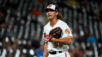 BALTIMORE, MD - AUGUST 20: Hunter Harvey #56 of the Baltimore Orioles walks off the field between innings against the Kansas City Royals at Oriole Park at Camden Yards on August 20, 2019 in Baltimore, Maryland. (Photo by Will Newton/Getty Images)