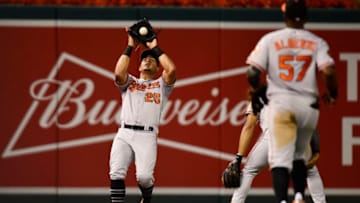 WASHINGTON, DC - AUGUST 27: Anthony Santander #25 of the Baltimore Orioles catches a foul ball hit by Trea Turner #7 of the Washington Nationals (not pictured) in the third inning during the interleague game at Nationals Park on August 27, 2019 in Washington, DC. (Photo by Patrick McDermott/Getty Images)