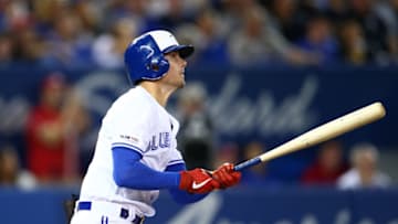 TORONTO, ON - SEPTEMBER 10: Cavan Biggio #8 of the Toronto Blue Jays hits a home run in the third inning during a MLB game against the Boston Red Sox at Rogers Centre on September 10, 2019 in Toronto, Canada. (Photo by Vaughn Ridley/Getty Images)