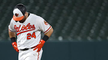 BALTIMORE, MARYLAND - AUGUST 22: DJ Stewart #24 of the Baltimore Orioles reacts after flying out against the Tampa Bay Rays during the eighth inning at Oriole Park at Camden Yards on August 22, 2019 in Baltimore, Maryland. (Photo by Patrick Smith/Getty Images)