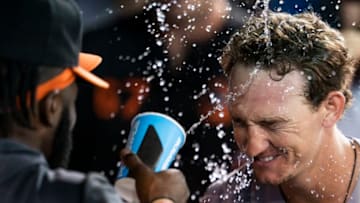 TORONTO, ONTARIO - SEPTEMBER 23: Austin Hays #21 of the Baltimore Orioles gets water thrown at him after hitting a home run against the Toronto Blue Jays in the fifth inning during their MLB game at the Rogers Centre on September 23, 2019 in Toronto, Canada. (Photo by Mark Blinch/Getty Images)