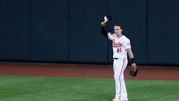 BALTIMORE, MARYLAND - SEPTEMBER 19: Austin Hays #21 of the Baltimore Orioles tips his hat to the crowd after robbing Vladimir Guerrero Jr. #27 of the Toronto Blue Jays (not pictured) of a home run in the fourth inning at Oriole Park at Camden Yards on September 19, 2019 in Baltimore, Maryland. (Photo by Rob Carr/Getty Images)