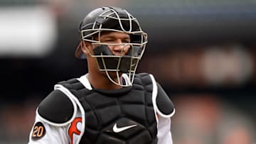 BALTIMORE, MD - SEPTEMBER 08: Pedro Severino #28 of the Baltimore Orioles catches against the Texas Rangers at Oriole Park at Camden Yards on September 8, 2019 in Baltimore, Maryland. (Photo by G Fiume/Getty Images)