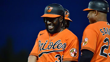 SARASOTA, FLORIDA - MARCH 10: Dwight Smith Jr. #35 of the Baltimore Orioles laughs it off after being hit by a pitch thrown by Philip Pfeifer #67 of the Atlanta Braves during the sixth inning of a Grapefruit League spring training game at Ed Smith Stadium on March 10, 2020 in Sarasota, Florida. (Photo by Julio Aguilar/Getty Images)