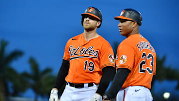 SARASOTA, FLORIDA - MARCH 10: Chris Davis #19 of the Baltimore Orioles stands with first base coach Anthony Sanders #23 after being walked during the sixth inning of a Grapefruit League spring training game against the Atlanta Braves at Ed Smith Stadium on March 10, 2020 in Sarasota, Florida. (Photo by Julio Aguilar/Getty Images)