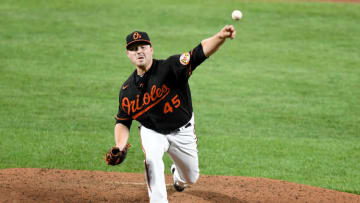 BALTIMORE, MD - AUGUST 14: Keegan Akin #45 of the Baltimore Orioles makes his MLB debut in the fifth inning against the Washington Nationals at Oriole Park at Camden Yards on August 14, 2020 in Baltimore, Maryland. (Photo by Greg Fiume/Getty Images)