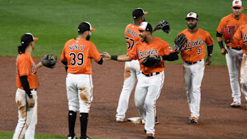 BALTIMORE, MD - AUGUST 15: The Baltimore Orioles celebrate after a 7-3 victory against the Washington Nationals at Oriole Park at Camden Yards on August 15, 2020 in Baltimore, Maryland. (Photo by Greg Fiume/Getty Images)