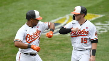 BALTIMORE, MD - AUGUST 16: Pedro Severino #28 of the Baltimore Orioles celebrates with Chance Sisco #15 after hitting a three-run home run in the sixth inning against the Washington Nationals at Oriole Park at Camden Yards on August 16, 2020 in Baltimore, Maryland. (Photo by Greg Fiume/Getty Images)