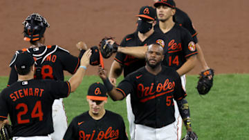 BALTIMORE, MARYLAND - JULY 31: Hanser Alberto #57 of the Baltimore Orioles celebrates the Orioles 6-3 win over the Tampa Bay Rays at Oriole Park at Camden Yards on July 31, 2020 in Baltimore, Maryland. (Photo by Rob Carr/Getty Images)