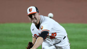 BALTIMORE, MARYLAND - SEPTEMBER 16: Starting pitcher Keegan Akin #45 of the Baltimore Orioles throws to a Atlanta Braves batter in the first inning at Oriole Park at Camden Yards on September 16, 2020 in Baltimore, Maryland. (Photo by Rob Carr/Getty Images)