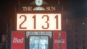 BALTIMORE, MD - SEPTEMBER 06: The scoreboard after Cal Ripken Jr. #8 of the Baltimore Orioles breaks Lou Gehrig's record for consecutive game played with his 2131 career game, during a game against the California Angels at Oriole Park at Camden Yards on September 6, 1995 in Baltimore, Maryland. (Photo by Mitchell Layton/Getty Images)