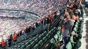 Orioles Fans stand for the playing of the national anthem at Oriole Park at Camden Yards. (Photo by Rob Carr/Getty Images)