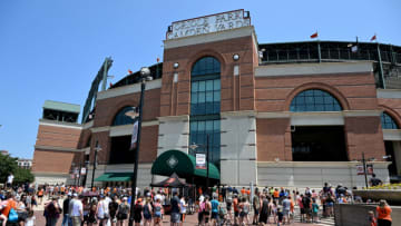 Fans line up to get into the game between the Baltimore Orioles and the Tampa Bay Rays. (Photo by G Fiume/Getty Images)