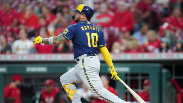 CINCINNATI, OHIO - SEPTEMBER 24: Omar Narvaez #10 of the Milwaukee Brewers hits a single in the third inning against the Cincinnati Reds at Great American Ball Park on September 24, 2022 in Cincinnati, Ohio. (Photo by Dylan Buell/Getty Images)