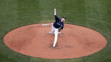 SEATTLE, WASHINGTON - OCTOBER 04: Chris Flexen #77 of the Seattle Mariners pitches during the third inning against the Detroit Tigers at T-Mobile Park on October 04, 2022 in Seattle, Washington. (Photo by Steph Chambers/Getty Images)