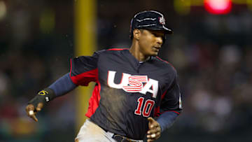 PHOENIX, AZ - MARCH 09: Adam Jones #10 of Team USA runs against Team Italy during the World Baseball Classic First Round Group D game on March 9, 2013 at Chase Field in Phoenix, Arizona. (Photo by Brace Hemmelgarn/Minnesota Twins/Getty Images)