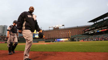 BALTIMORE, MD - APRIL 14: Starting pitcher CC Sabathia #52 and catcher Brian McCann #34 of the New York Yankees walk in from the bullpen before the start of their game against the Baltimore Orioles at Oriole Park at Camden Yards on April 14, 2015 in Baltimore, Maryland. (Photo by Rob Carr/Getty Images)