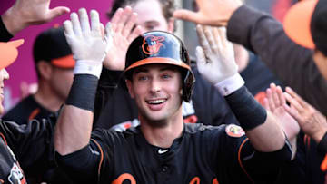 ANAHEIM, CA - MAY 20: Joey Rickard #23 of the Baltimore Orioles returns to the dugout after hitting a homerun in the first inning against the Los Angeles Angels of Anaheim at Angel Stadium of Anaheim on May 20, 2016 in Anaheim, California. (Photo by Lisa Blumenfeld/Getty Images)