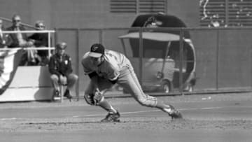 PITTSBURGH, PA - OCTOBER 14, 1971: Thirdbaseman Brooks Robinson #5 of the Baltimore Orioles can't handle the ground ball hit by firstbaseman Bob Robertson #7 of the Pittsburgh Pirates during the third inning of game five of the World Series on October 14, 1971 at Three Rivers Stadium in Pittsburgh, Pennsylvania. 711014-06 (Photo by: Ron Kuntz Collection/Diamond Images/Getty Images)