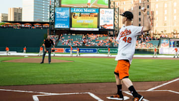 BALTIMORE, MD - JUNE 21: Luke Terry, a 15-year-old one-armed catcher catches a pitch from Jim Palmer before the game between the Baltimore Orioles and the Cleveland Indians at Oriole Park at Camden Yards on June 21, 2017 in Baltimore, Maryland. (Photo by Rob Tringali/SportsChrome/Getty Images) *** Local Caption ***