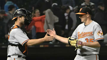 CHICAGO, IL - MAY 21: Brad Brach #35 of the Baltimore Orioles and Andrew Susac #27 celebrate their win against the Chicago White Sox on May 21, 2018 at Guaranteed Rate Field in Chicago, Illinois. The Orioles won 3-2. (Photo by David Banks/Getty Images)