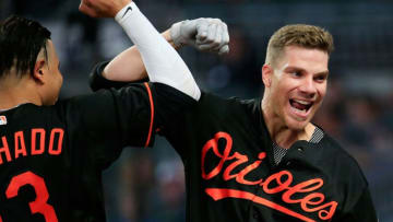 ATLANTA, GA - JUNE 22: Chris Davis #19 of the Baltimore Orioles celebrates a solo home run with Manny Machado #13 during the fifth inning against the Atlanta Braves at SunTrust Park on June 22, 2018 in Atlanta, Georgia. (Photo by Daniel Shirey/Getty Images)