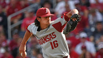Omaha, NE - JUNE 26: Pitcher Blaine Knight #16 of the Arkansas Razorbacks delivers a pitch in the first inning during game one of the College World Series Championship Series against the Oregon State Beavers on June 26, 2018 at TD Ameritrade Park in Omaha, Nebraska. (Photo by Peter Aiken/Getty Images)