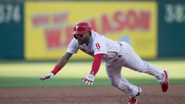 PHILADELPHIA, PA - JUNE 30: Jesmuel Valentin #9 of the Philadelphia Phillies slides in safely after hitting a triple in the bottom of the second inning against the Washington Nationals at Citizens Bank Park on June 30, 2018 in Philadelphia, Pennsylvania. (Photo by Mitchell Leff/Getty Images)