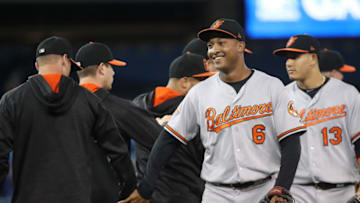 TORONTO, ON - SEPTEMBER 13: 13: Jonathan Schoop #6 of the Baltimore Orioles celebrates their victory with teammates during MLB game action against the Toronto Blue Jays at Rogers Centre on September 13, 2017 in Toronto, Canada. (Photo by Tom Szczerbowski/Getty Images)