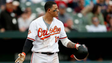 BALTIMORE, MD - APRIL 23: Manny Machado #13 of the Baltimore Orioles reacts after a wild pitch thrown by Matt Barnes #68 of the Boston Red Sox (not pictured) in the eighth inning at Oriole Park at Camden Yards on April 23, 2017 in Baltimore, Maryland. (Photo by Matt Hazlett/Getty Images)