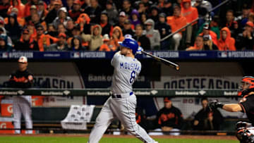 BALTIMORE, MD - OCTOBER 10: Mike Moustakas #8 of the Kansas City Royals hits a two run home run to right center field against Brian Matusz #17 of the Baltimore Orioles in the tenth inning during Game One of the American League Championship Series at Oriole Park at Camden Yards on October 10, 2014 in Baltimore, Maryland. (Photo by Rob Carr/Getty Images)