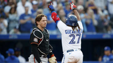 TORONTO, ON - JUNE 15: Vladimir Guerrero Jr. #27 of the Toronto Blue Jays celebrates his solo home-run in the seventh inning of their MLB game against the Toronto Blue Jays at Rogers Centre on June 15, 2022 in Toronto, Canada. (Photo by Cole Burston/Getty Images)