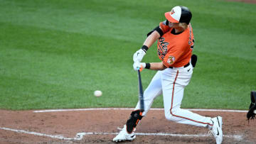 BALTIMORE, MARYLAND - AUGUST 20: Kyle Stowers #83 of the Baltimore Orioles drives in a run with a ground out in the seventh inning against the Boston Red Sox at Oriole Park at Camden Yards on August 20, 2022 in Baltimore, Maryland. (Photo by Greg Fiume/Getty Images)