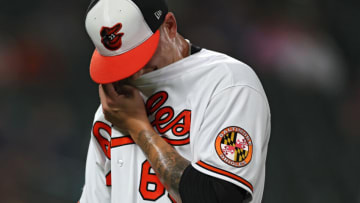 BALTIMORE, MARYLAND - SEPTEMBER 19: Starting pitcher Tyler Wells #68 of the Baltimore Orioles reacts as he is relieved against the Detroit Tigers during the fourth inning at Oriole Park at Camden Yards on September 19, 2022 in Baltimore, Maryland. (Photo by Patrick Smith/Getty Images)