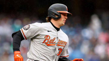 NEW YORK, NEW YORK - OCTOBER 02: Adley Rutschman #35 of the Baltimore Orioles hits a single in the first inning against the New York Yankees at Yankee Stadium on October 02, 2022 in the Bronx borough of New York City. (Photo by Elsa/Getty Images)