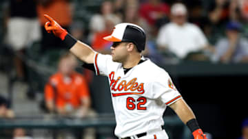 BALTIMORE, MD - SEPTEMBER 19: DJ Stewart #62 of the Baltimore Orioles celebrates after hitting a solo home run against the Toronto Blue Jays at Oriole Park at Camden Yards on September 19, 2018 in Baltimore, Maryland. (Photo by Rob Carr/Getty Images)