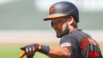 BOSTON, MA - JULY 26: Anthony Santander #25 of the Baltimore Orioles reacts as he returns to the dugout after hitting a two-run home run in the fourth inning of a game against the Boston Red Sox at Fenway Park on July 26, 2020 in Boston, Massachusetts. (Photo by Adam Glanzman/Getty Images)